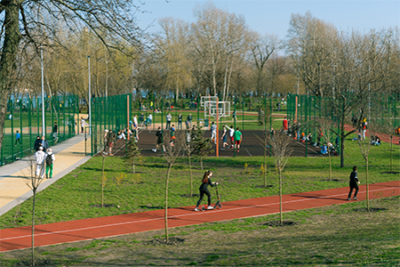 People having fun and enjoying activity in public park